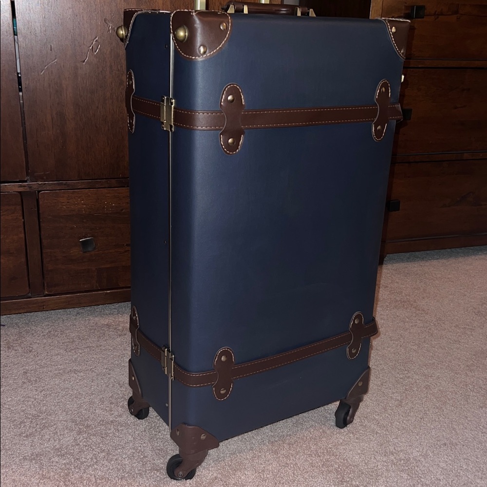 Neely & Chloe x Couper collab luggage suitcase